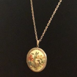 Gold tone vintage floral picture locket